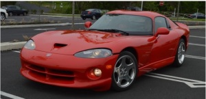 This is a 2001 Dodge Viper I found for sale on EbayMotors for $31k. The MSRP on this car new would have been anywhere between $65k-$75k. It has 15k miles which basically is a new car. For window shopping purposes, you can buy this Viper or a brand new V8 Camaro or Mustang for the same price. The Dodge will probably cost more for insurance and replacement parts. The upside of car like this is there will be thousands of other Camaros and Mustangs. How many Dodge Vipers will you see on the road? Not many. 